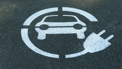 A parking space for an electric vehicle.