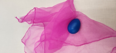 dark pink scarf and dark blue shaker egg