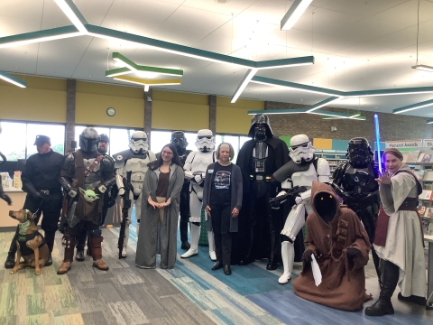 Stars Wars cosplayers dressed as Stormtroopers, C-3PO, Jawas, etc.