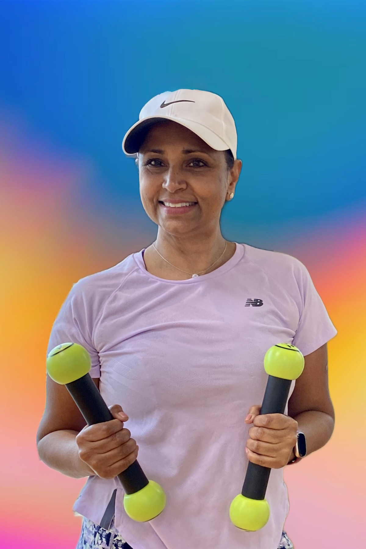 Presenter Vinita Patel holding two cardio toning sticks.